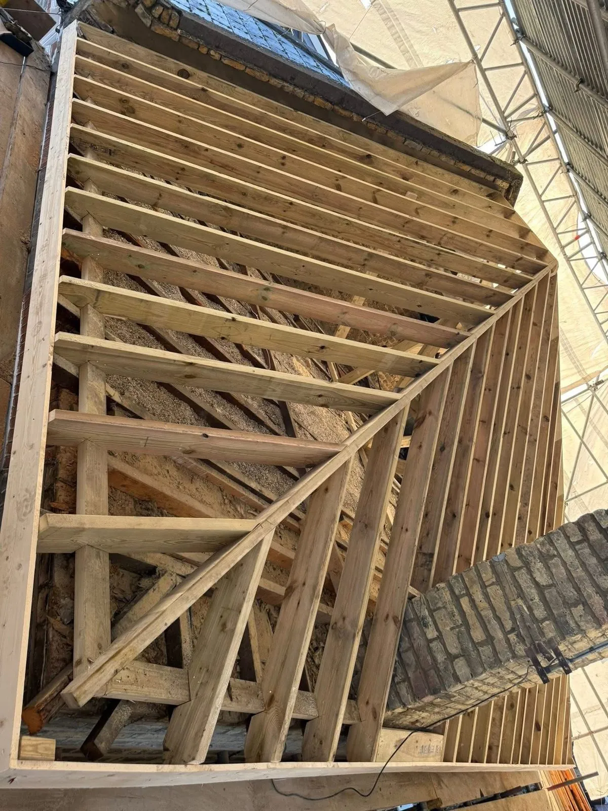 New roof timbers and rafters during a re-roof in St Blazey